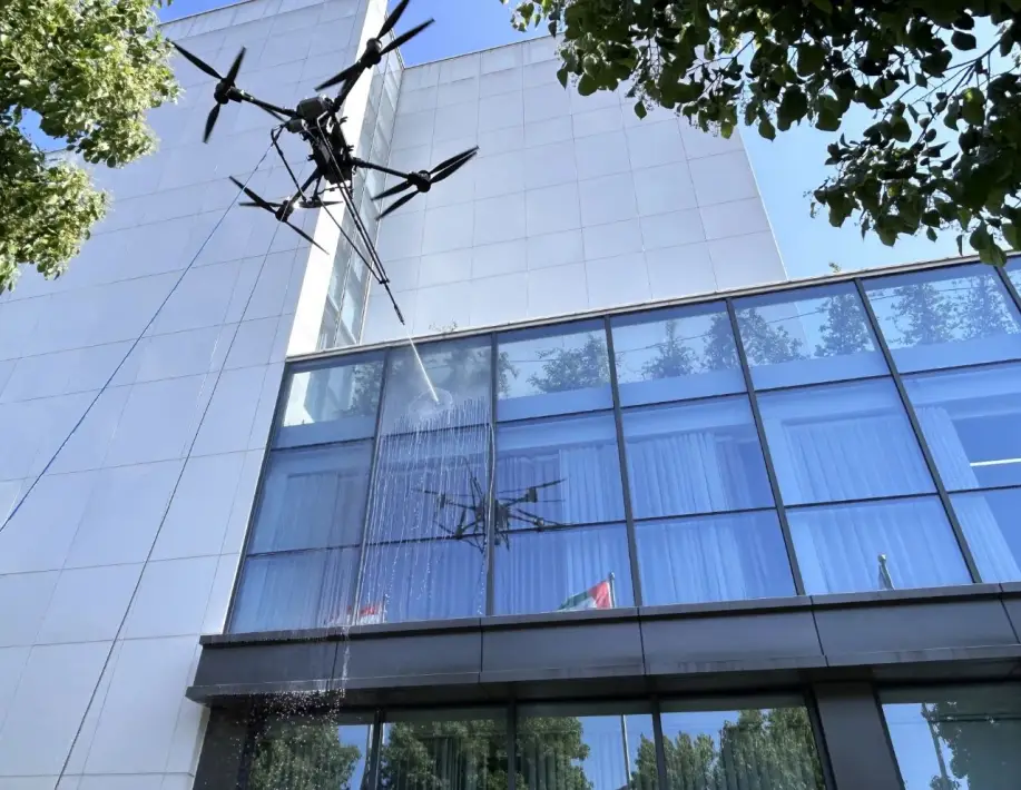cleaning drone operating on high-rise building facade